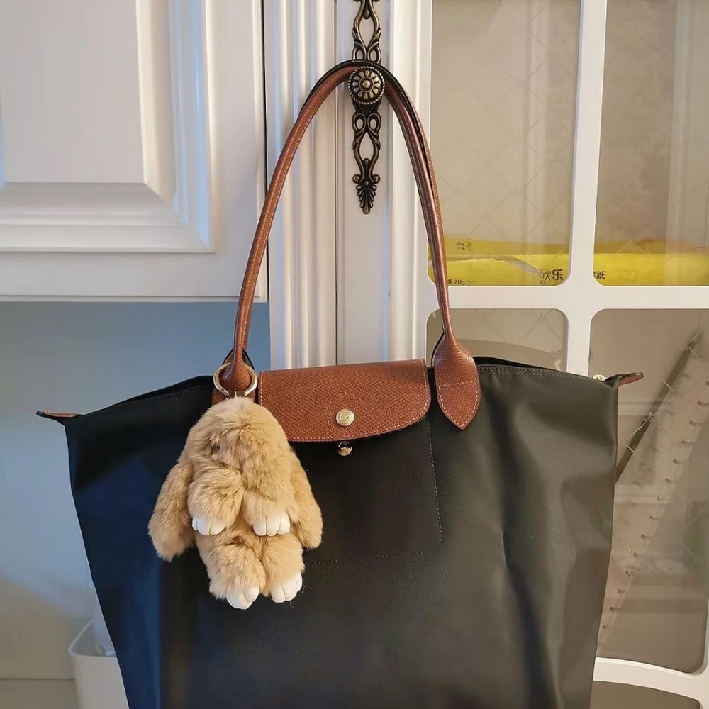 Longchamp Black Tote with Brown Trim and Tan Plush Charm - Picture 2 of 6